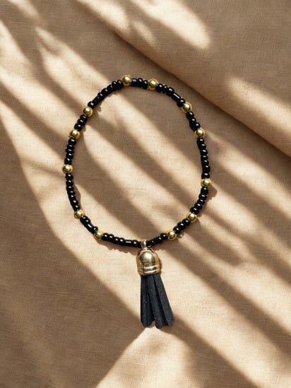 Kralenarmband met kwastje - Zwart