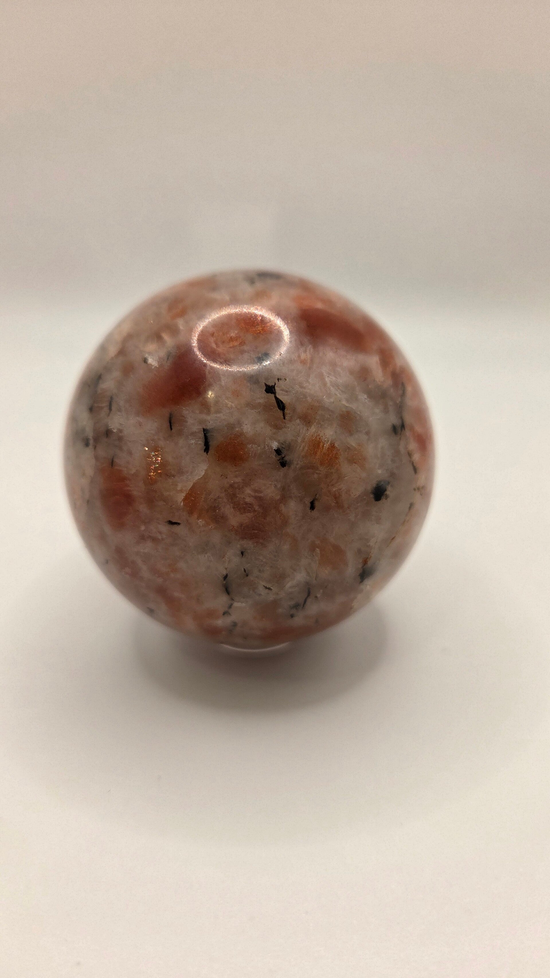 Zonnesteen bol met toermalijn kwarts