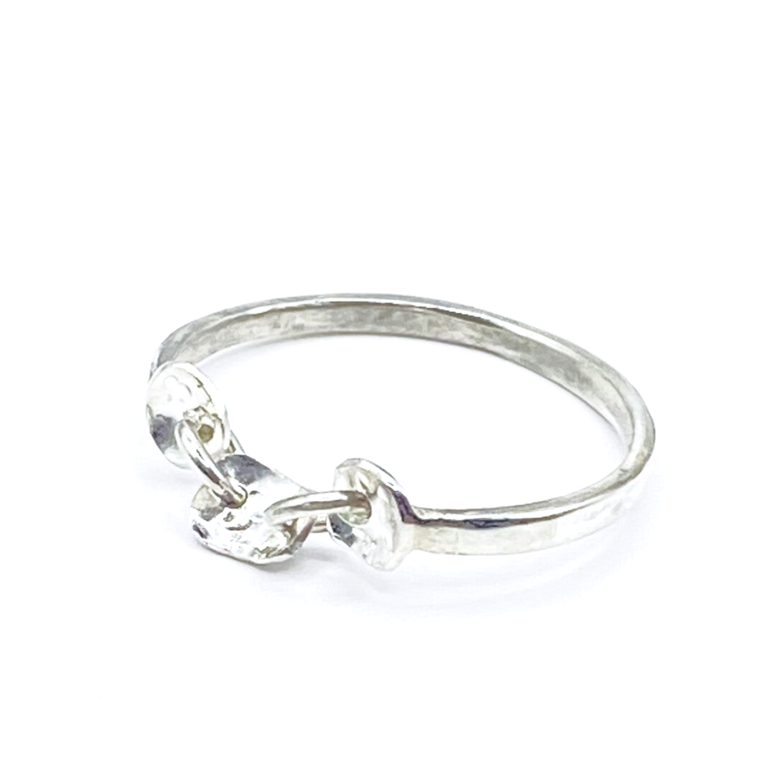 Zilveren ring met bewegende delen