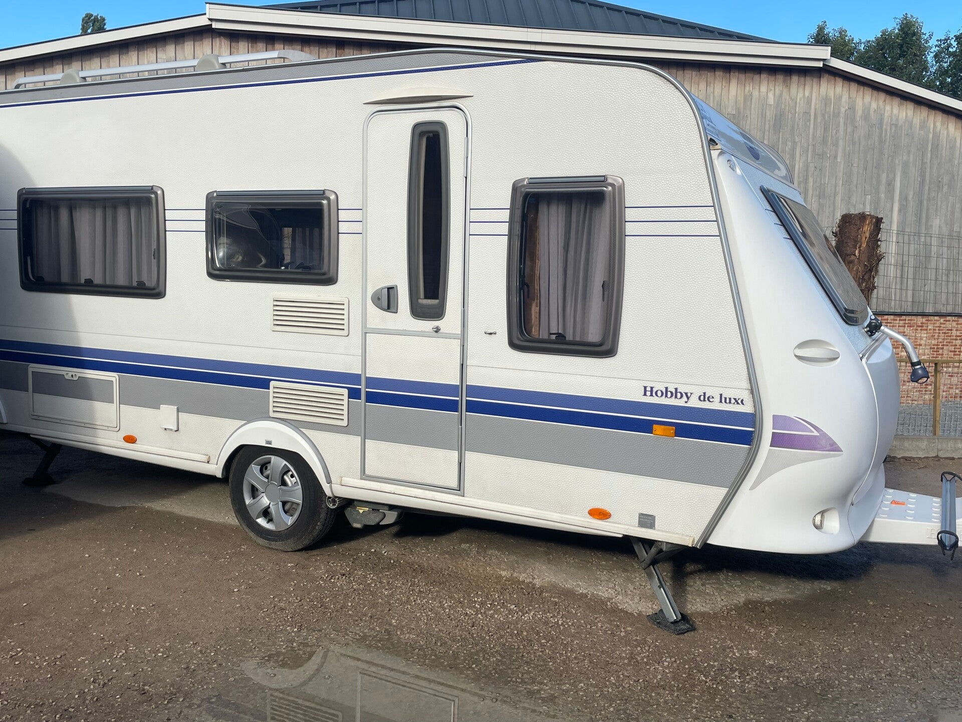 Hobby 460LU, 2 aparte bedden, rondzit, volautomatische mover, bankairco, voortent, Bj 2008