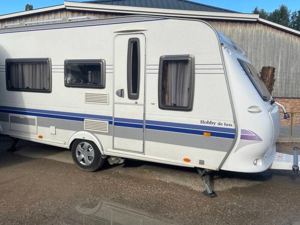 Hobby 460LU, 2 aparte bedden, rondzit, volautomatische mover, bankairco, voortent, Bj 2008