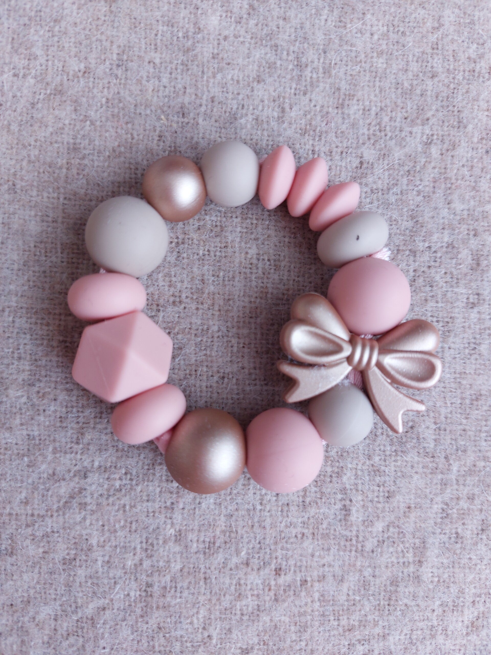 Bijtring roze - Strik