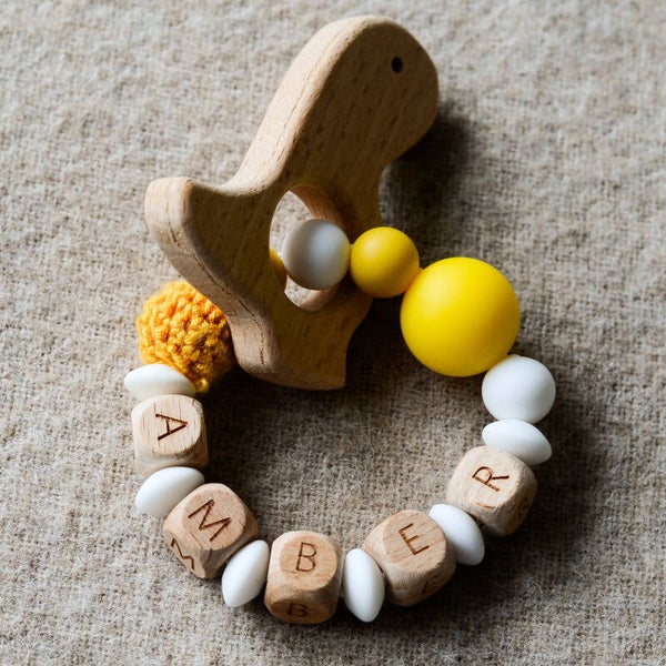 Bijtring met naam - Dino