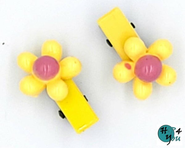 Haarmode: Kinder duckklem met gele bloem