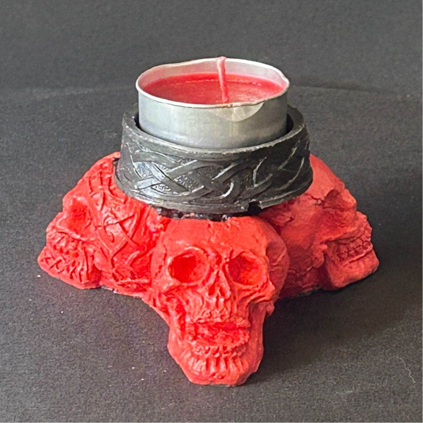Trio of skulls tealight holder