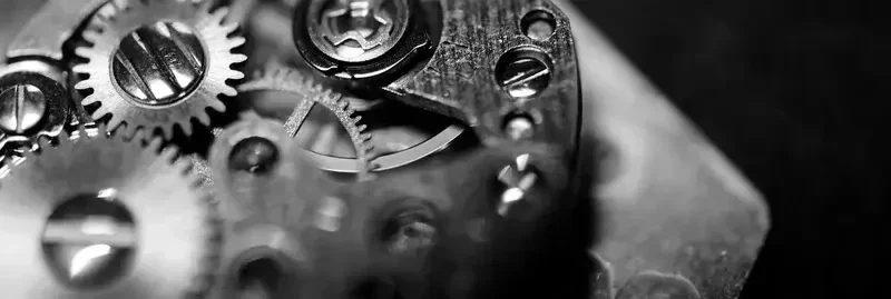 imagen que muestra los engranajes de un reloj