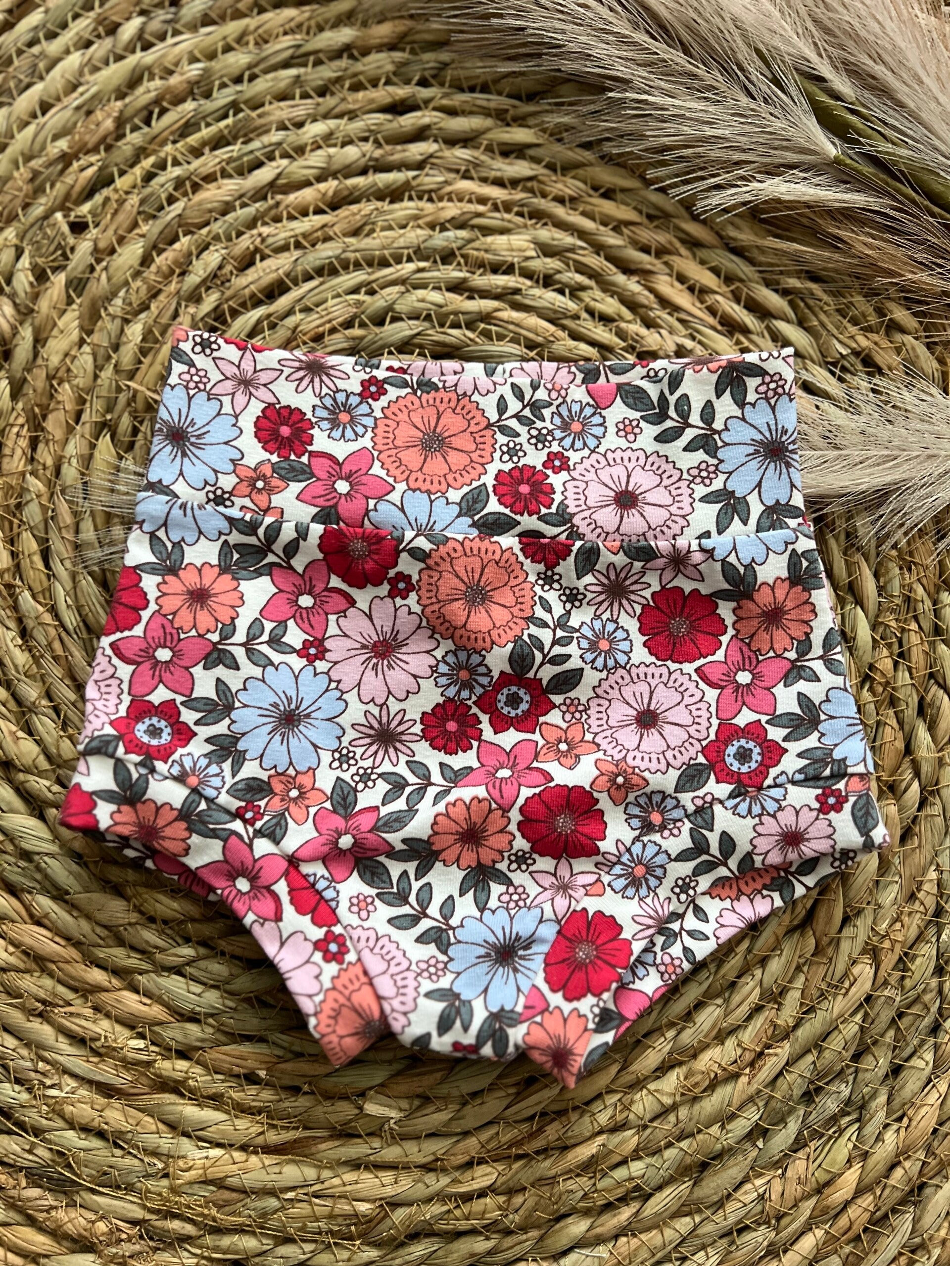 Bummie framboos bloemen 62/68