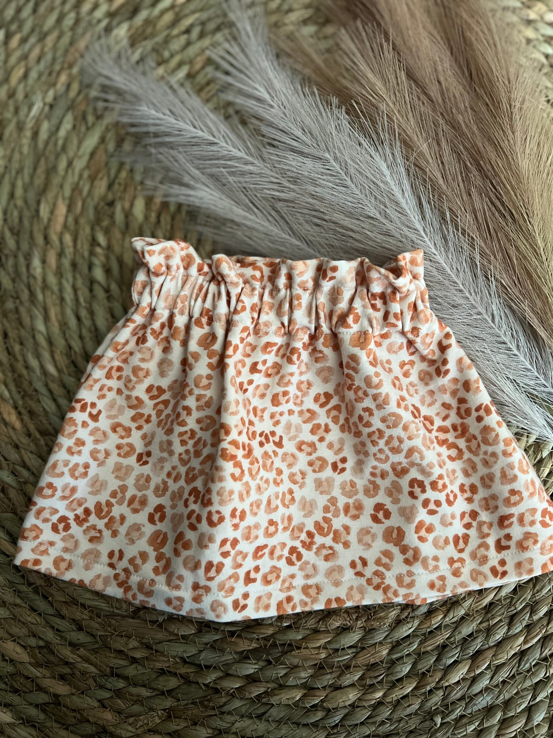 Rokje ruffle panter maat 74