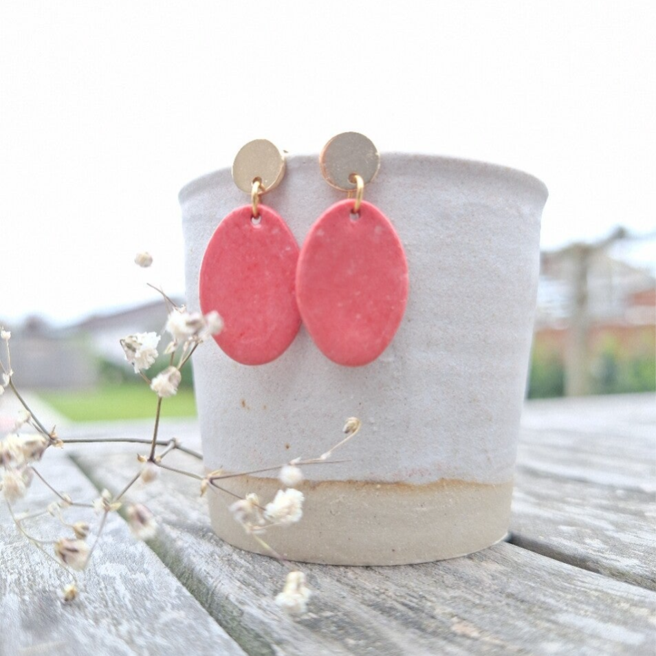 Roze ovalen porselein parels - RVS goud