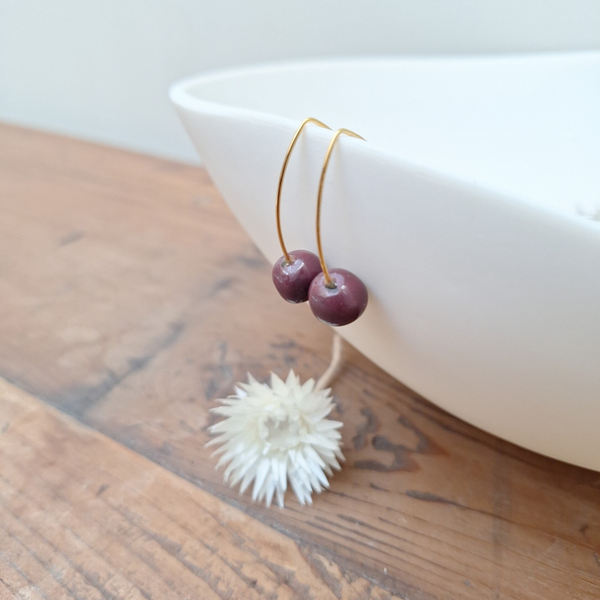 Paars/aubergine parel - RVS goud