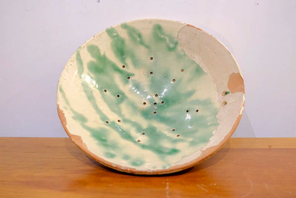Plato colador de cerámica