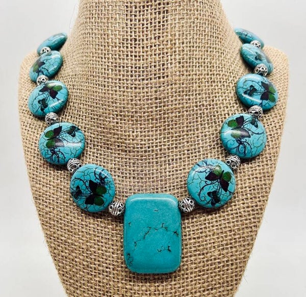 Turquoise pendent and butterfly beaded necklace