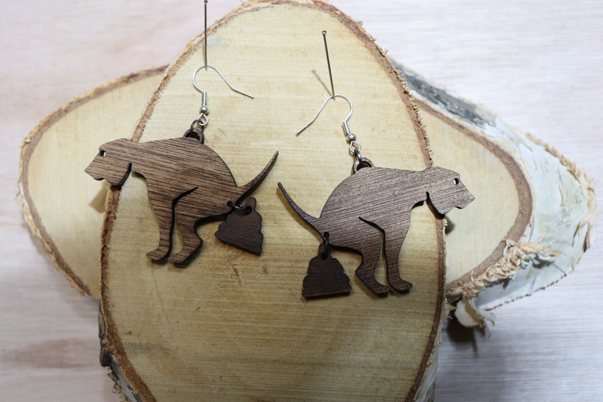 Shit oorbel poepende hond