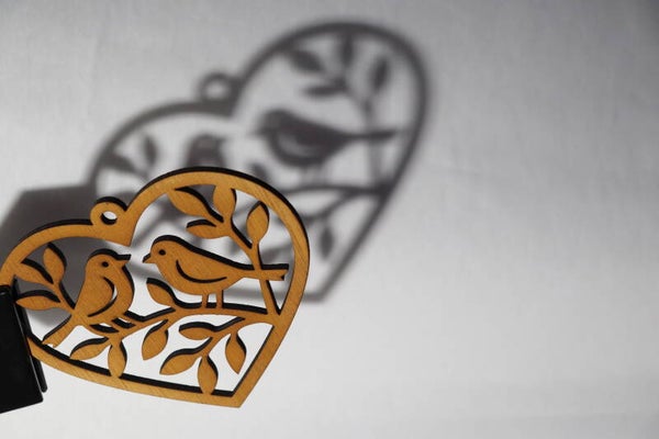 vogeltjes in hart met schaduw effect