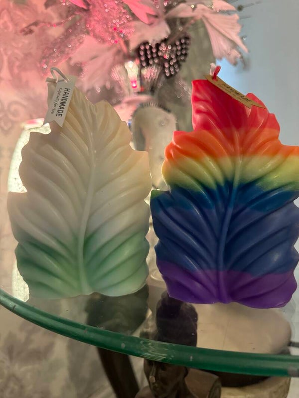 Large, feather candle