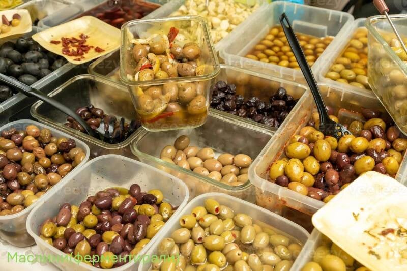 assortment-of-olives-being-sold-at-a-traditional-farmers-street-market-photo-standard-6q68ga.jpg
