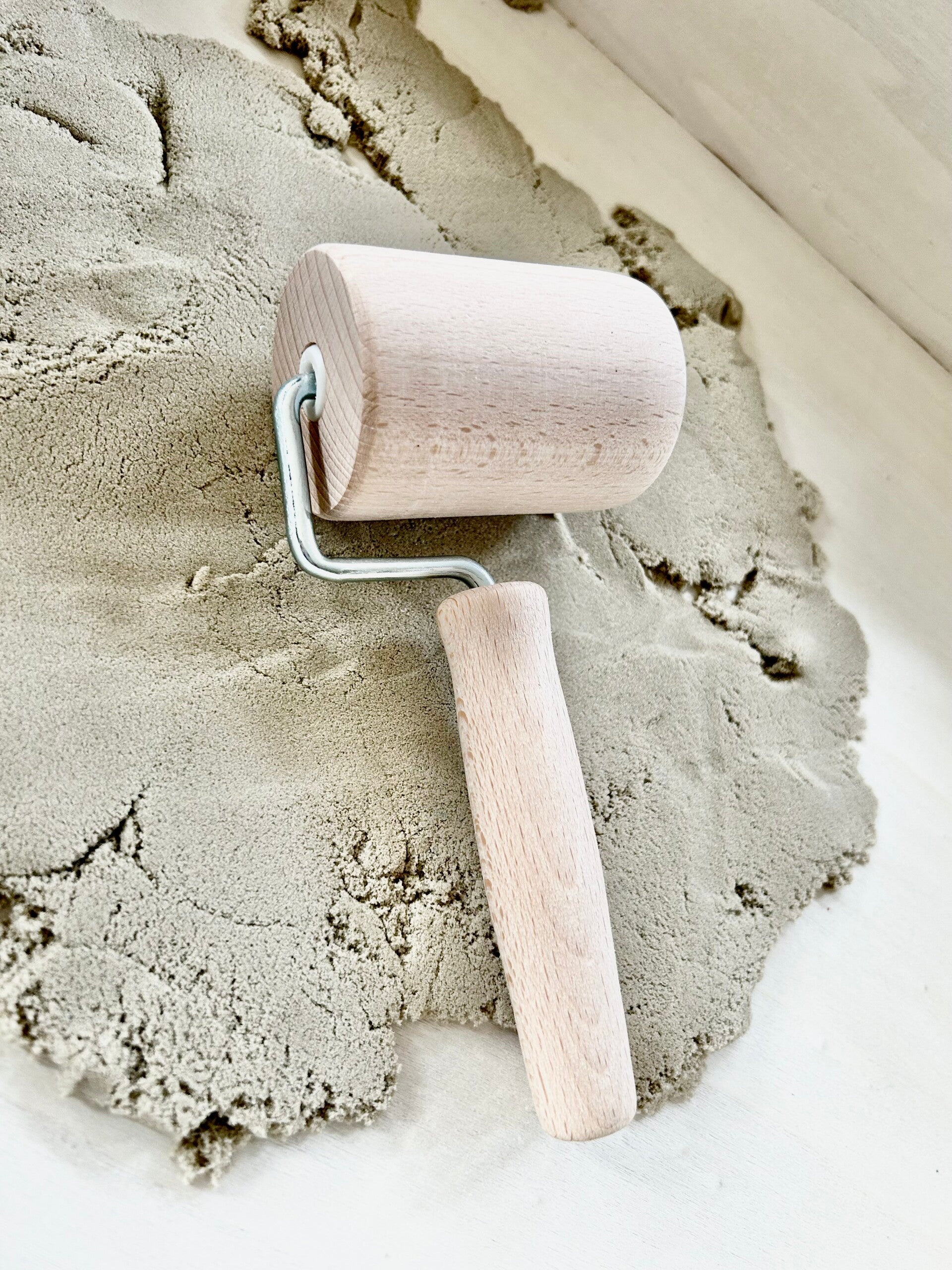 Houten roller met handvat