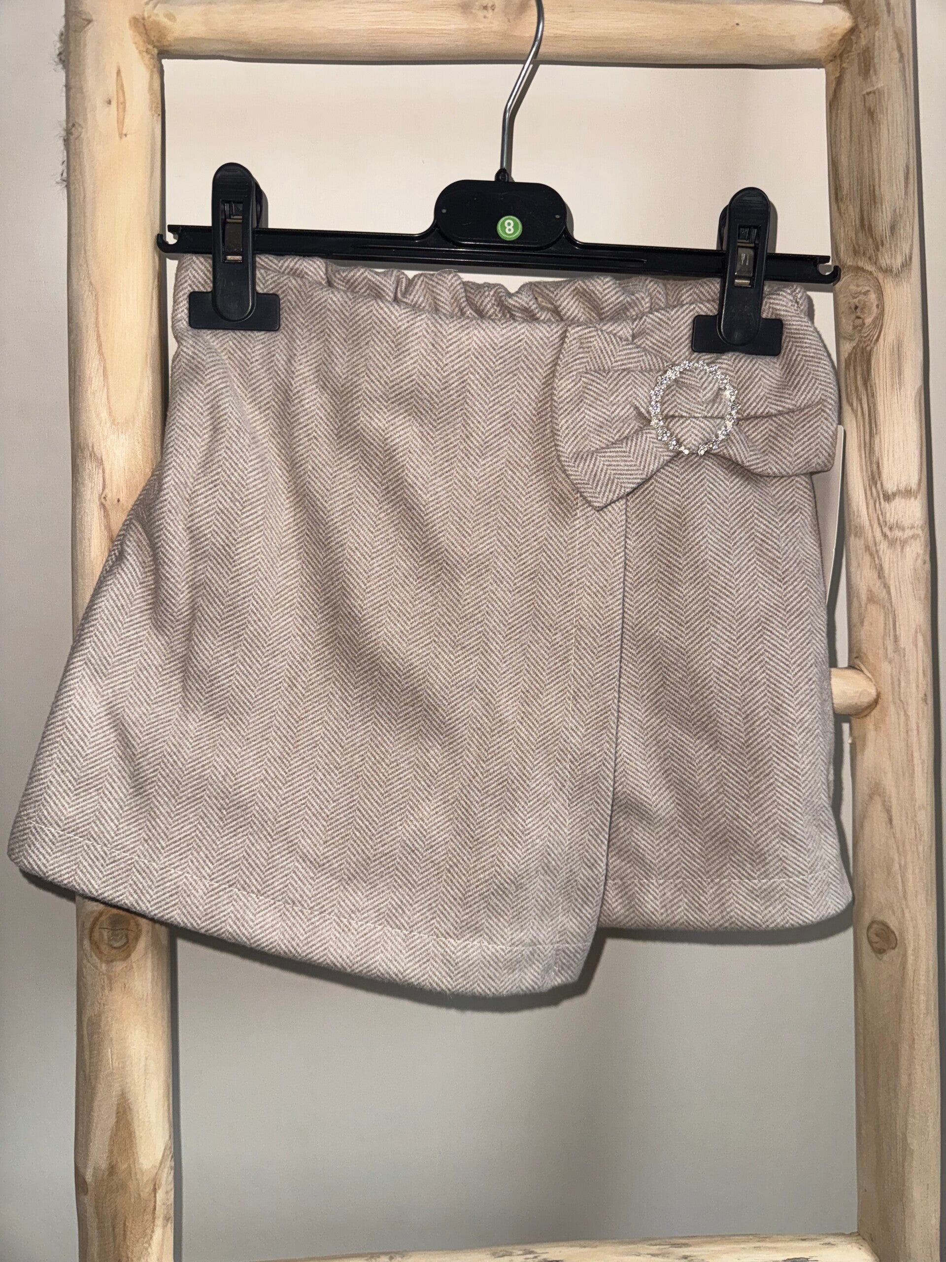 Beige visgraat skort