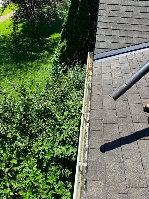 Professional residential gutter cleaning and maintenance in Cincinnati, Ohio by Nienaber And Sons Lawn Care.