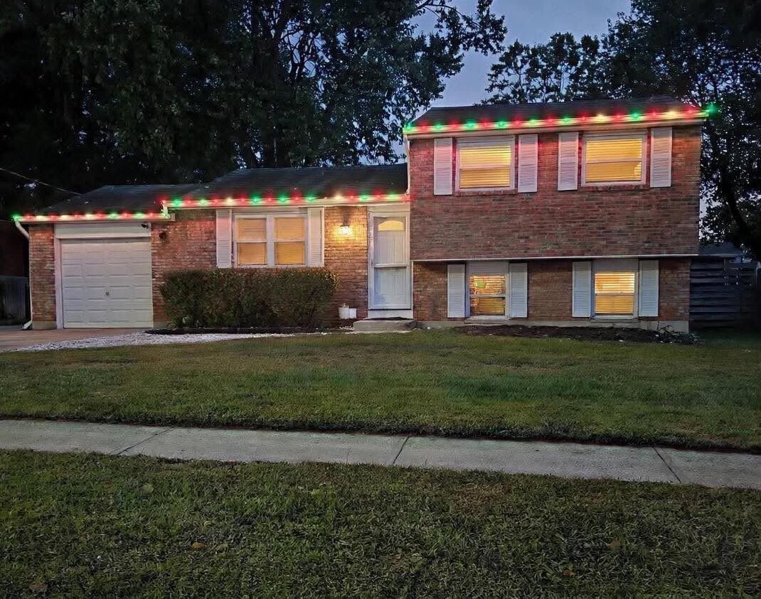 Professional Christmas light installation along a home's roofline in Cincinnati, OH