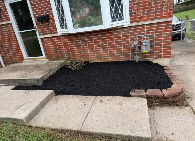 After photo of mulch installation and landscaping in Bridgetown, Ohio by Nienaber And Sons Lawn Care