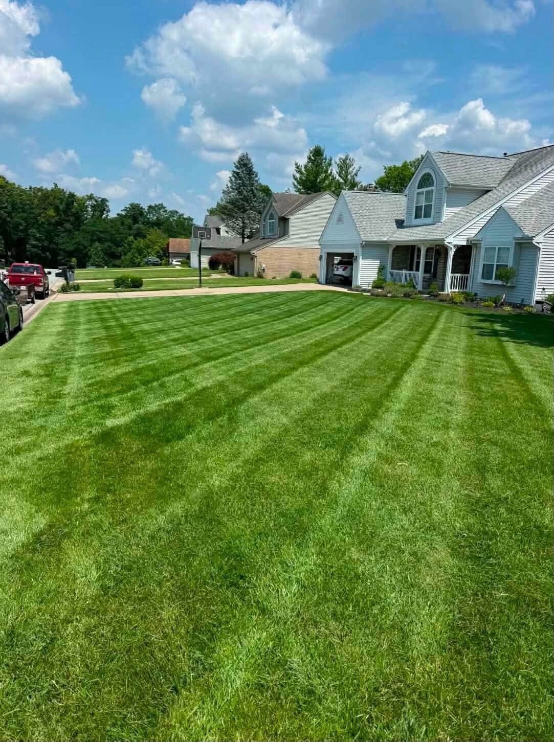 Thick, healthy green lawn maintained by Nienaber And Sons Lawn Care in Southwest Ohio