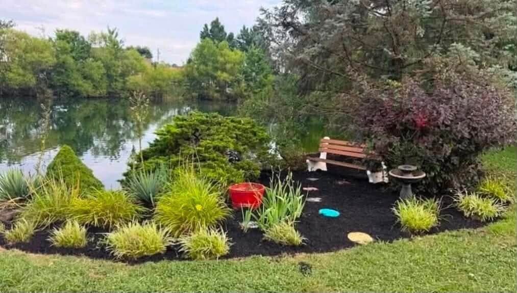 Professional landscape bed maintenance and French drain installation by Nienaber And Sons in Cincinnati Ohio