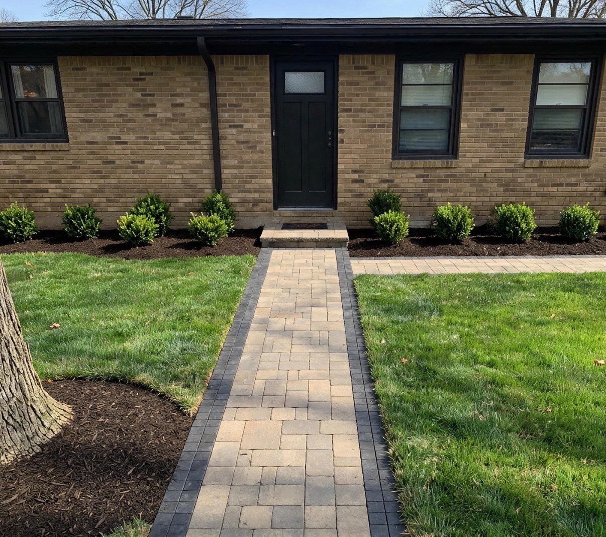Nienaber and Sons crew providing professional lawn care and landscaping services in Cincinnati, Ohio⁠