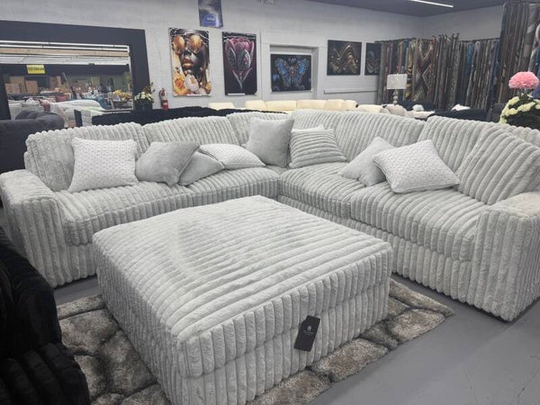 white oversized sectional with ottoman