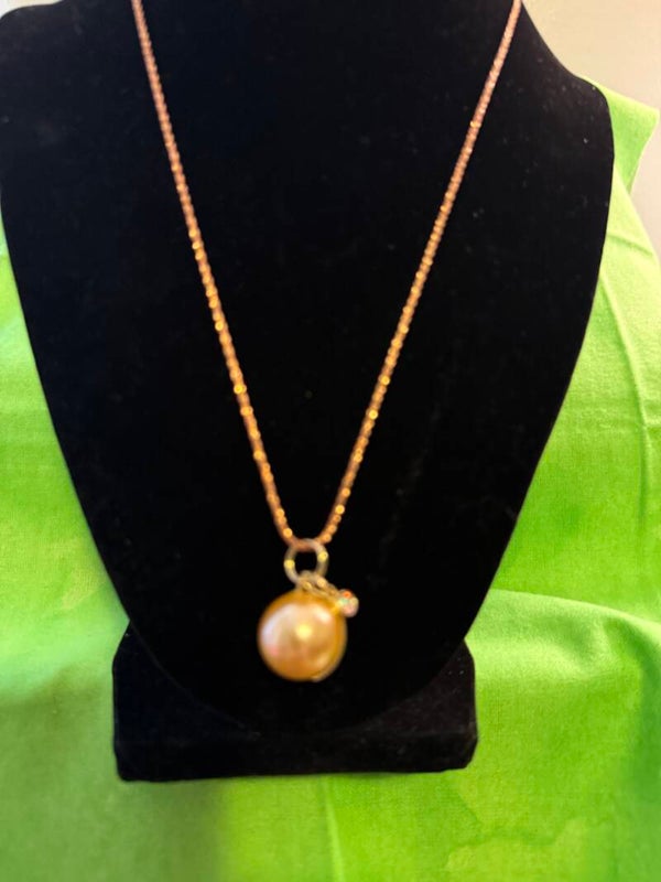 Golden Chain with Shell Pearl Pendant.