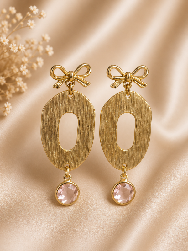 Élise Bow – Gouden Statement Oorbellen met Roze Kristal