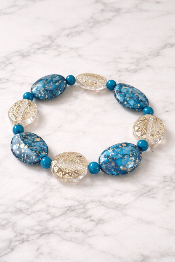 Celestial Ocean Armband – Blauwe Statement Kralen met Gouden Sterdetails
