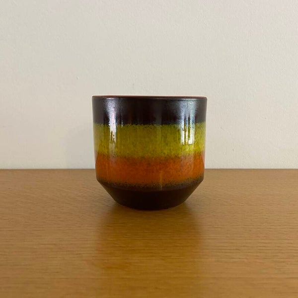 Vintage bloempot in bruin, lime en oranje