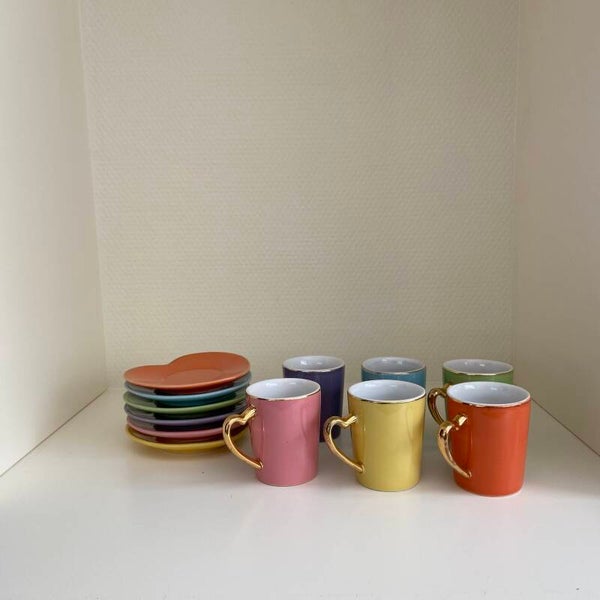 Set van 6 vintage kop en schotels met hartvormige schotel L. Dake en zn