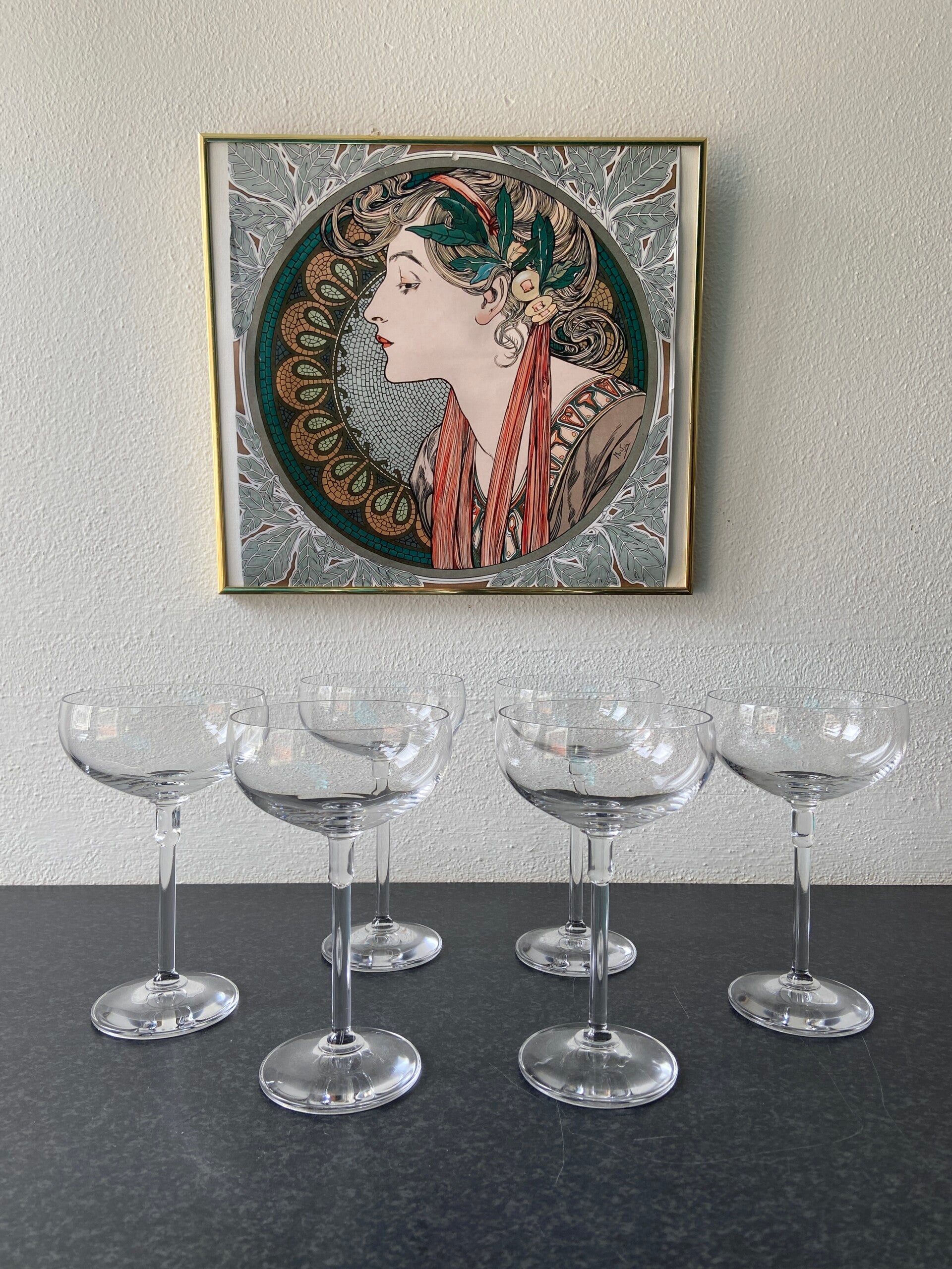 Set van 6 kristallen champagne coupes met bewerkte steel