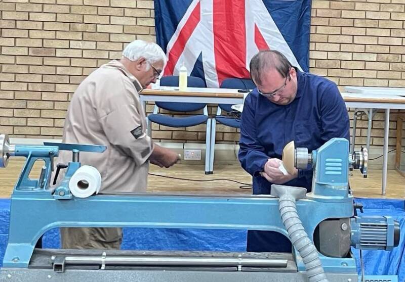 Barry showing James how to apply his sanding sealer before his final finish