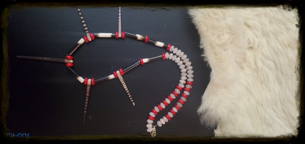 PU-001 Sea urchin spines, porcupine quills, rose quartz, red coral necklace