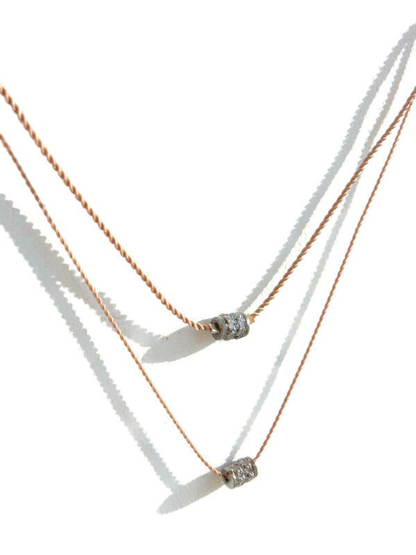 pave diamond rondelle on a superstrong cord