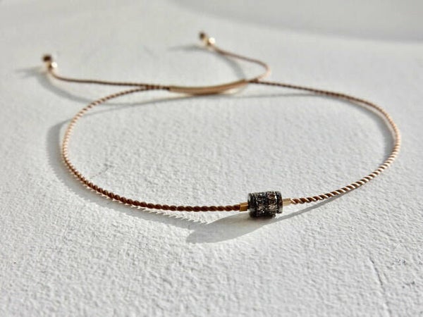 adjustable bracelet with a pave diamond rondelle