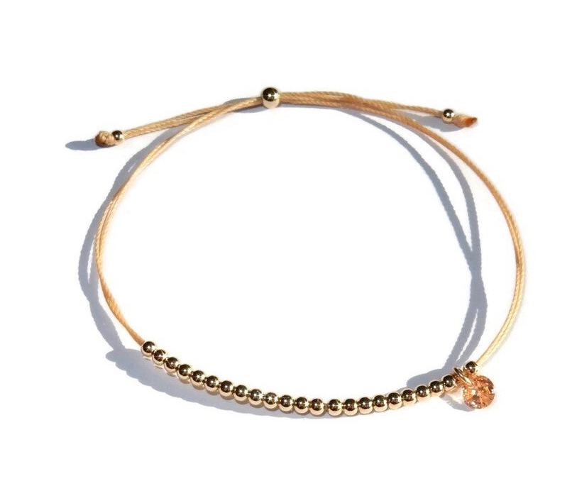 adjustable bracelet Happy champaign cord and CZ charm BH3196