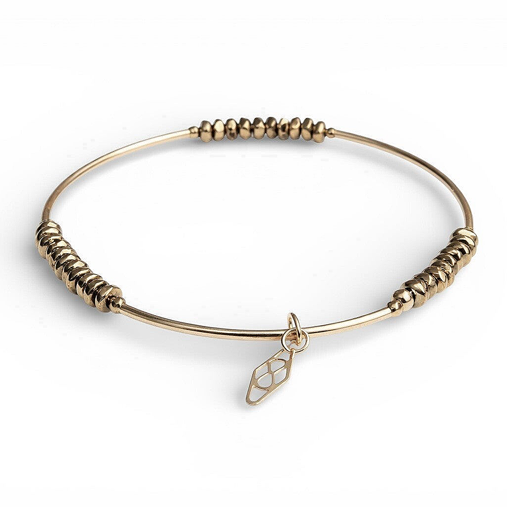 flexbracelet 3 mm faceted Hematite & goldfilled tubes BF3143