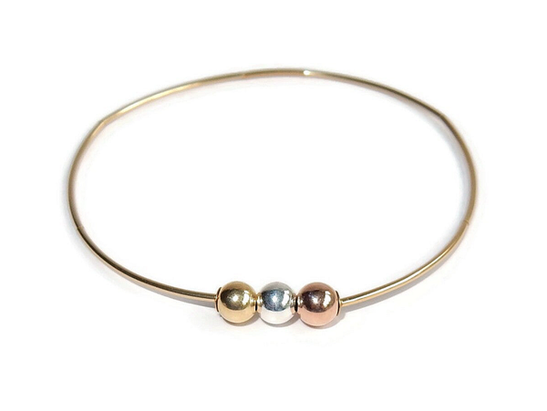 flexbracelet Luc Excl 1 mm tubes with three shiny 5 mm beads in silver, goldfilled and rosegoldfilled BFLM2211