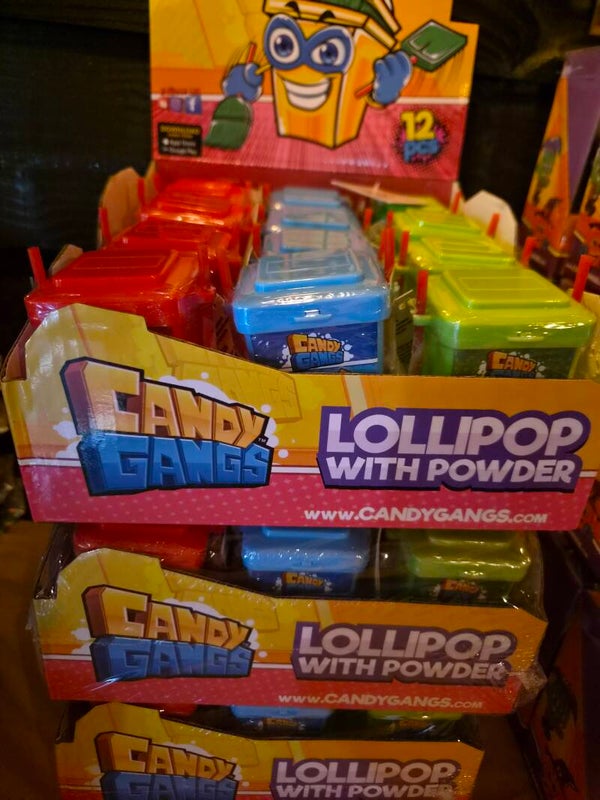 Lollipop dipper in een vuilnisbakje