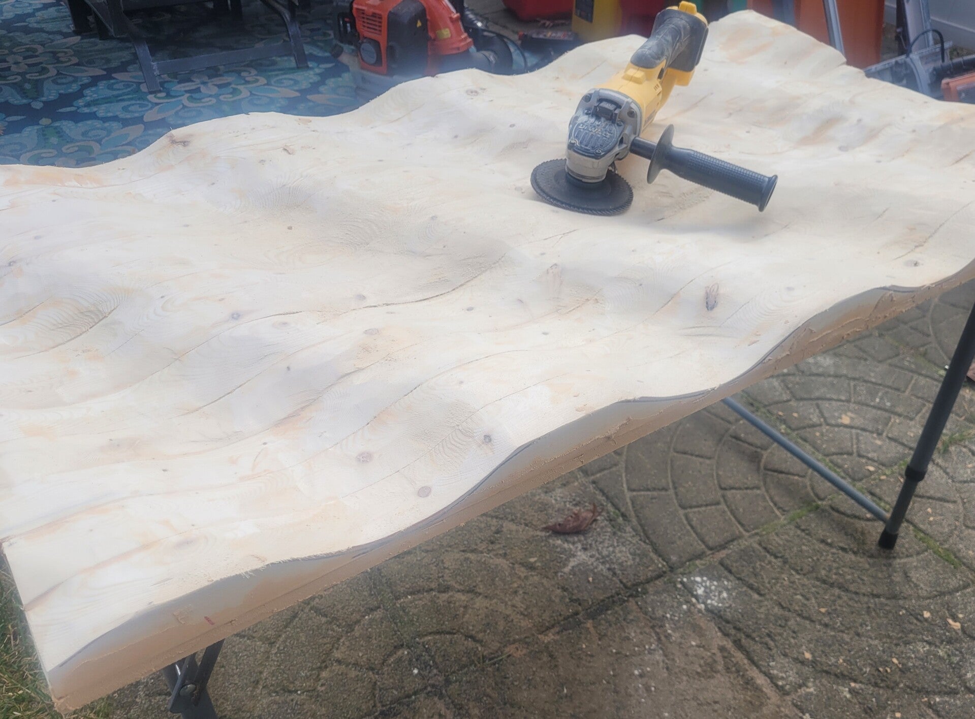Unfinished wavy wooden flag blank after sanding