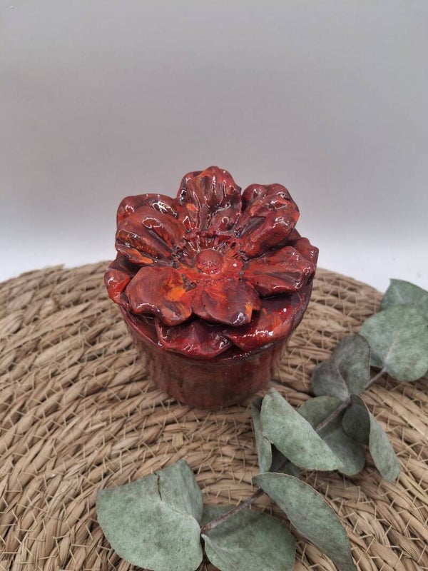 Urn bloem rood oranje