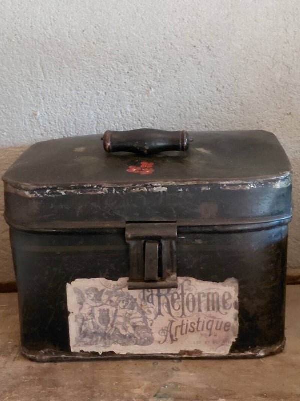 Antiek blik met handvat