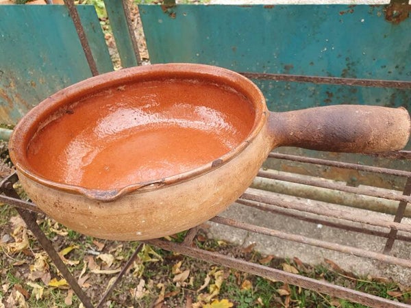Antieke terracotta fonduepan