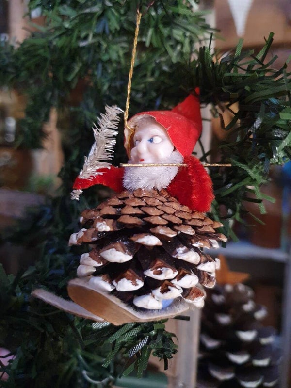 Vintage Kerstman op skies