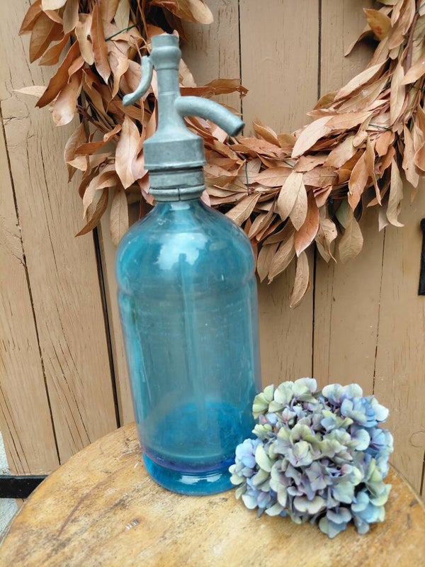 Blauwe spuitwaterfles, sifon