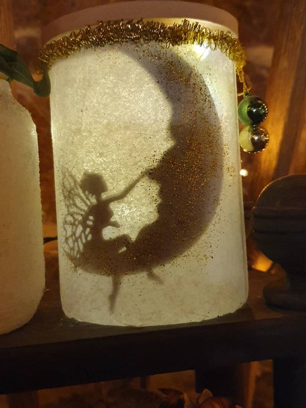 Kerst Twinkelaar elfje op de maan - Elfe scintillant de Noël sur la lune